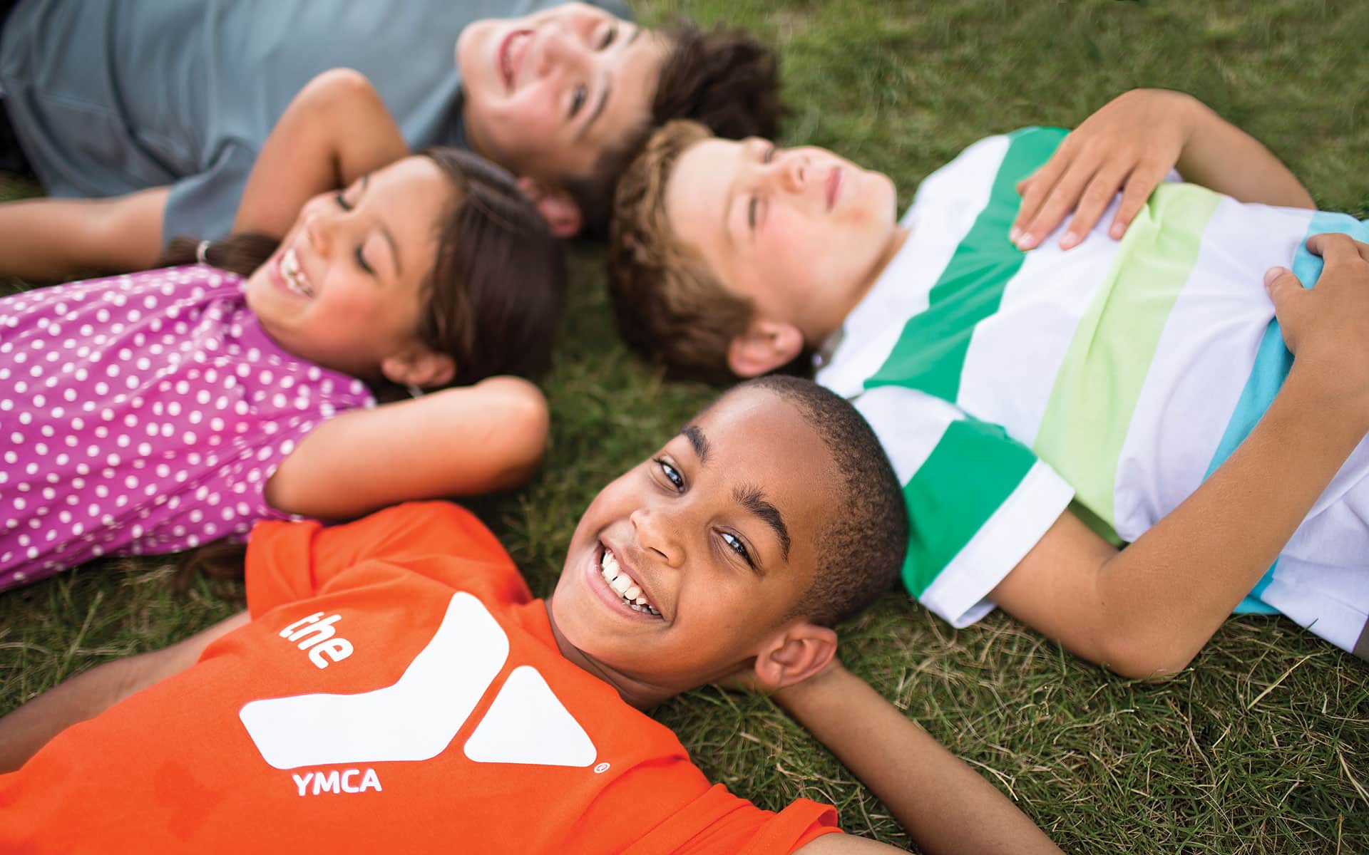 Y Kids lying on ground